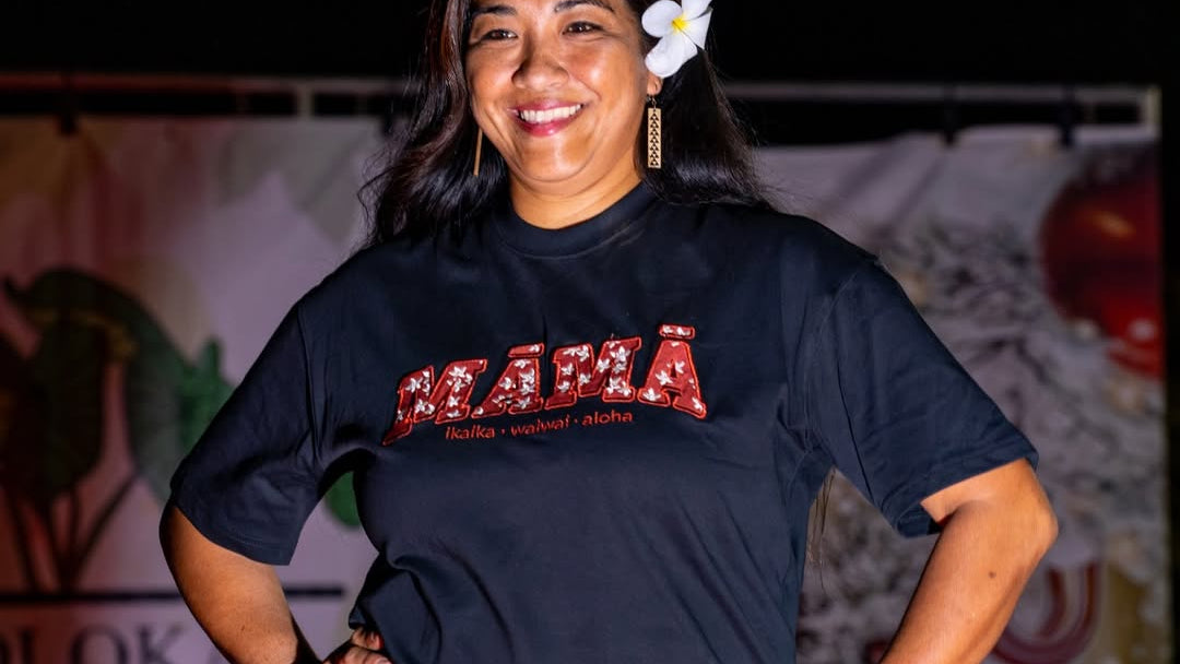 Embroidered Pua Kukui Māmā oversized tee in black with kukui flower embroidery